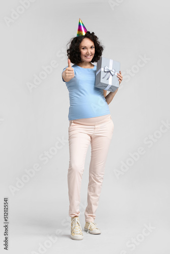 Young pregnant woman in par...