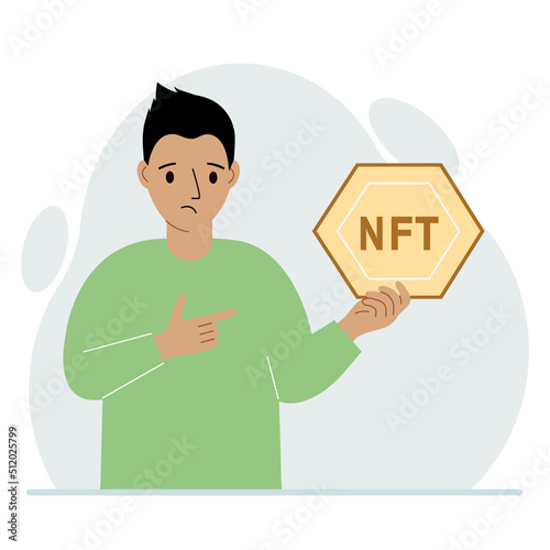 NFT concept. The man is holding nft in his hand. Works of art using non-fungible tokens for auctions, sale and purchase of works of art.