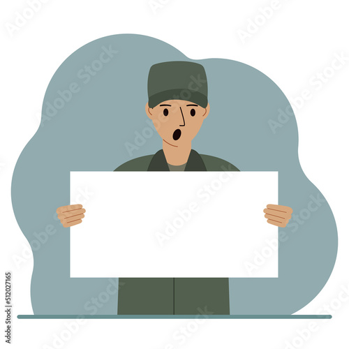 A military man in uniform holds a white sheet of paper in his hands. Concept for advertising, poster, banner.