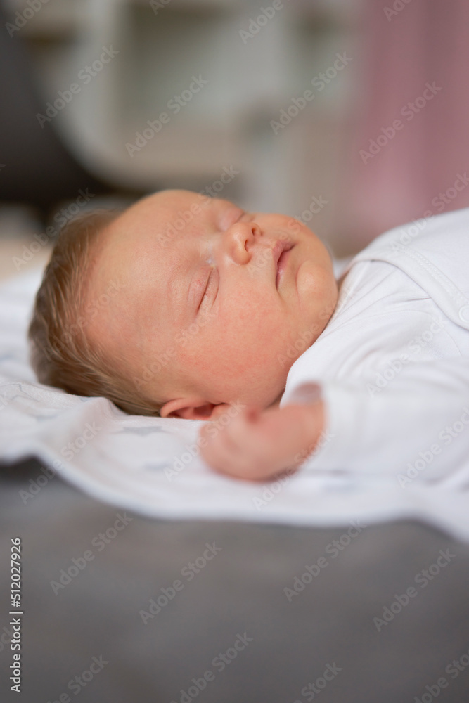 Cute baby boy sleeping on bed at home Cute baby boy sleeping on bed at home