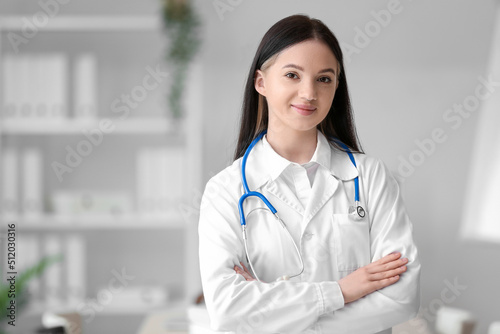 Female medical assistant smiling at hospital