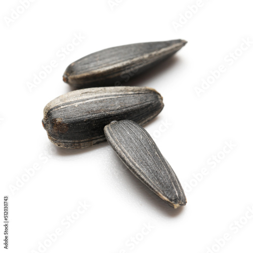 Wallpaper Mural Unpeeled sunflower seeds on white background Torontodigital.ca