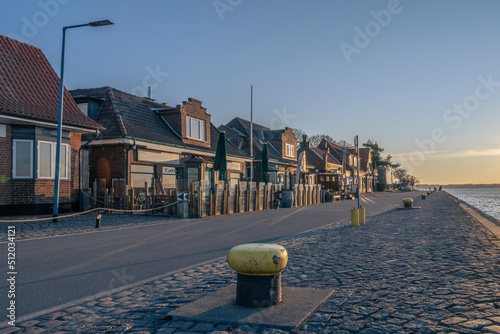 Germany, Schleswig-Holstein, Kiel,Row of beachside houses at dawn photo