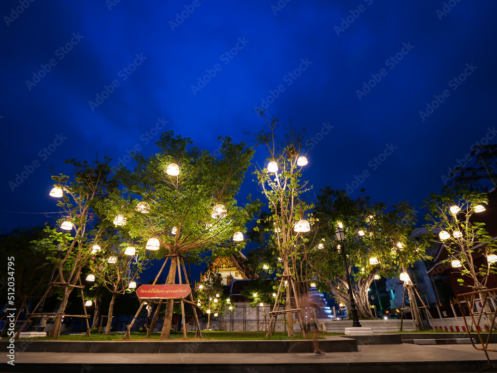 Obraz premium People Moved in front of The Bell Temple at Night