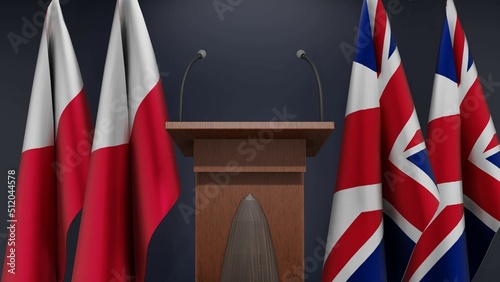 Fototapeta Naklejka Na Ścianę i Meble -  Flags of Poland and United Kingdom at international meeting or negotiations press conference. Podium speaker tribune with flags and coat arms. 3d rendering