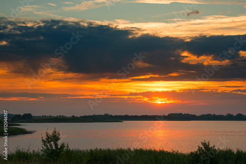 Serene landscape with a lake lake in the evening