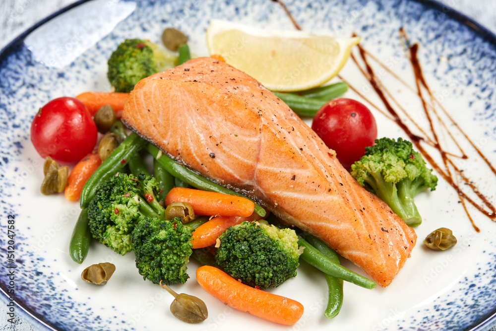 salmon steak with roasted vegetables salmon steak with roasted vegetables