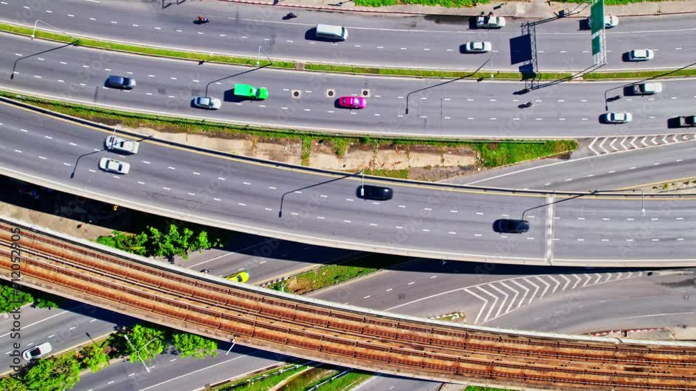 4K : Top view of Highway road junctions. The Intersection freeway. outer ring road. Aerial view from a drone. Nonthaburi, thailand.
4K : Top view of Highway road junctions. The Intersection freeway. outer ring road. Aerial view from a drone. Nonthaburi, thailand.