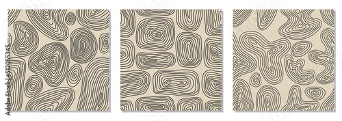 Trendy set of minimalist seamless patterns with abstract hand drawn composition