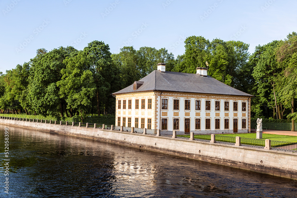 View of the summer palace of Peter the Great in the Summer garden on the bank of the Fontanka river. St. Petersburg, Russia