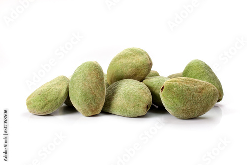 composite of fresh organic almonds isolated on white background