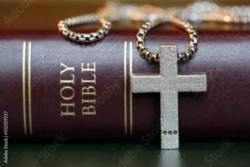 Holy Bible book with a Christian cross, symbol of Christianity, Yonne