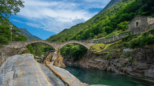 Ponte dei Salti bridge crossing the Verzasca River at Lavertezzo in the Verzasca Valley, Ticino in Switzerland photo