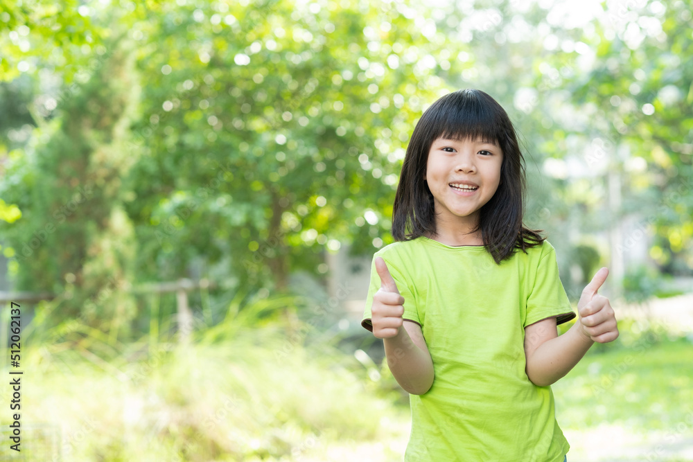 portrait asian kid, child enjoy and happy, the girl is smiling portrait asian kid, child enjoy and happy, the girl is smiling
