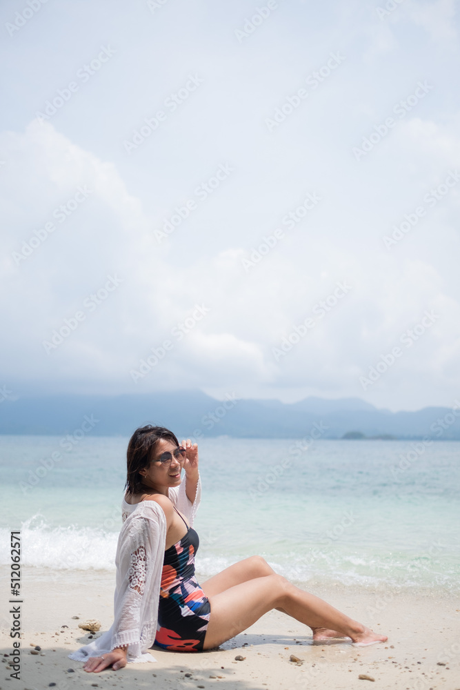 Portrait bikini girl with sea background, asian woman, beauty concept Portrait bikini girl with sea background, asian woman, beauty concept