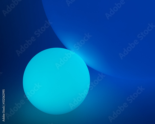 Glowing and illuminated spherical coloured orbs on a black background.