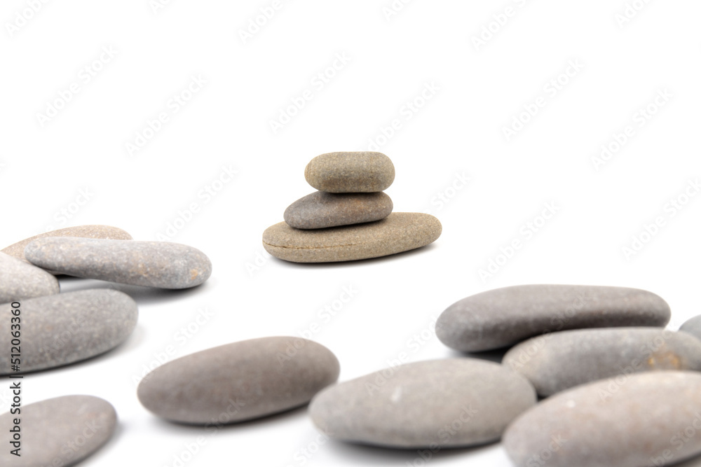 Zen stones on a light background. Minimalistic concept. Zen balance miditation concept. For branding and product presentation. Zen stones on a light background. Minimalistic concept. Zen balance miditation concept. For branding and product presentation.