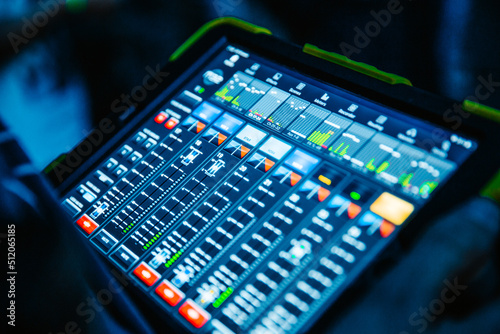 Sound and light mixer console on tablet