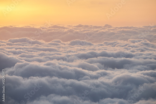 First rays of sun above the clouds.