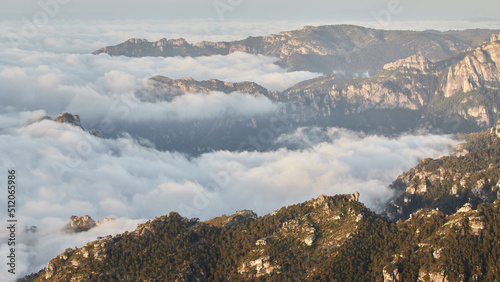 Sunrise from the clouds in the Els Ports natural park.