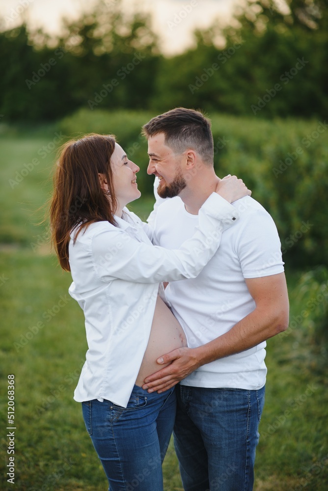 Portrait of lovely future parents during sunset Portrait of lovely future parents during sunset