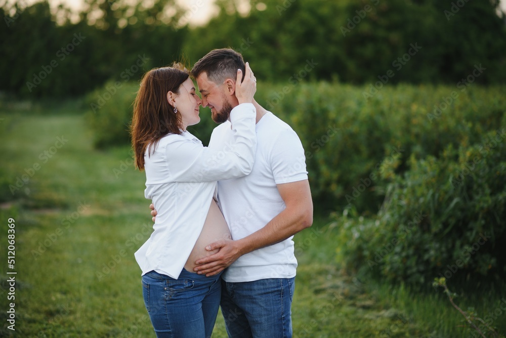 Portrait of lovely future parents during sunset Portrait of lovely future parents during sunset