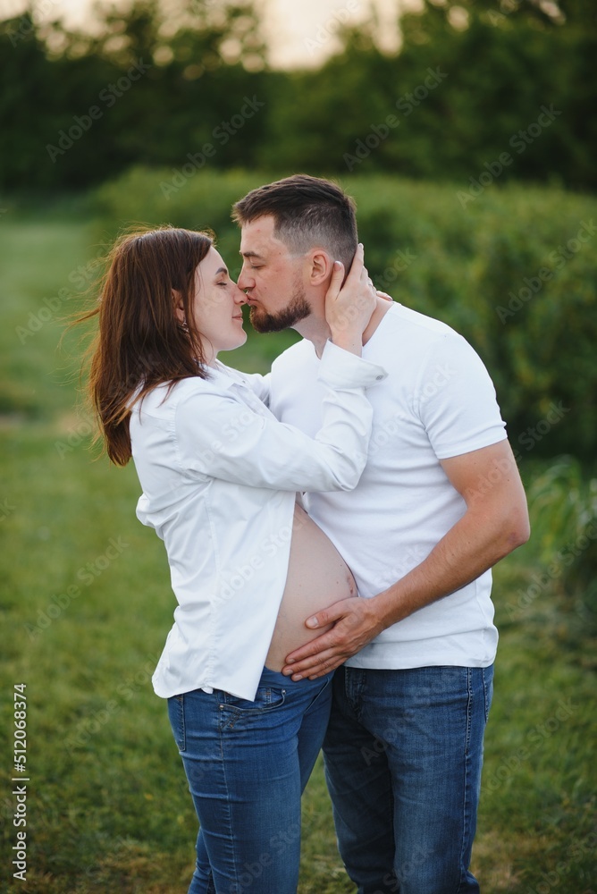 Portrait of lovely future parents during sunset Portrait of lovely future parents during sunset