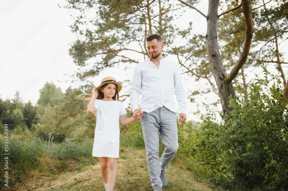 Fototapeta premium Father and daughter in nature