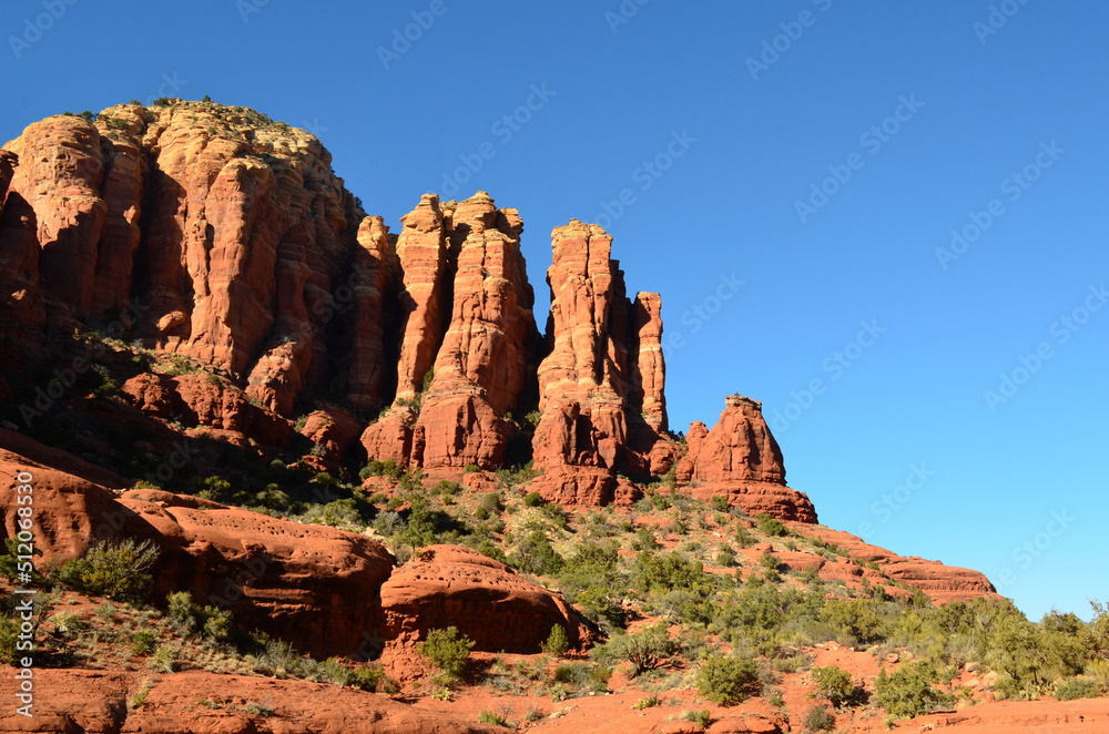 Fototapeta premium Vibrant Red Rock Formations and Blue Skies