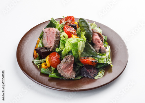salad with roastbeef and vegetables isolated on white