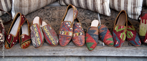 Slippers and shoes made of woven fabric in market in Turkey © isabela66
