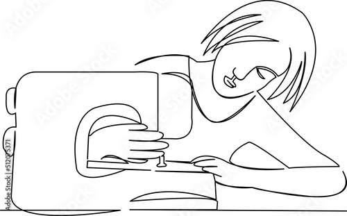 woman sewing on a sewing machine