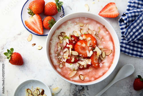 Homemade porridge with strawberry and almond