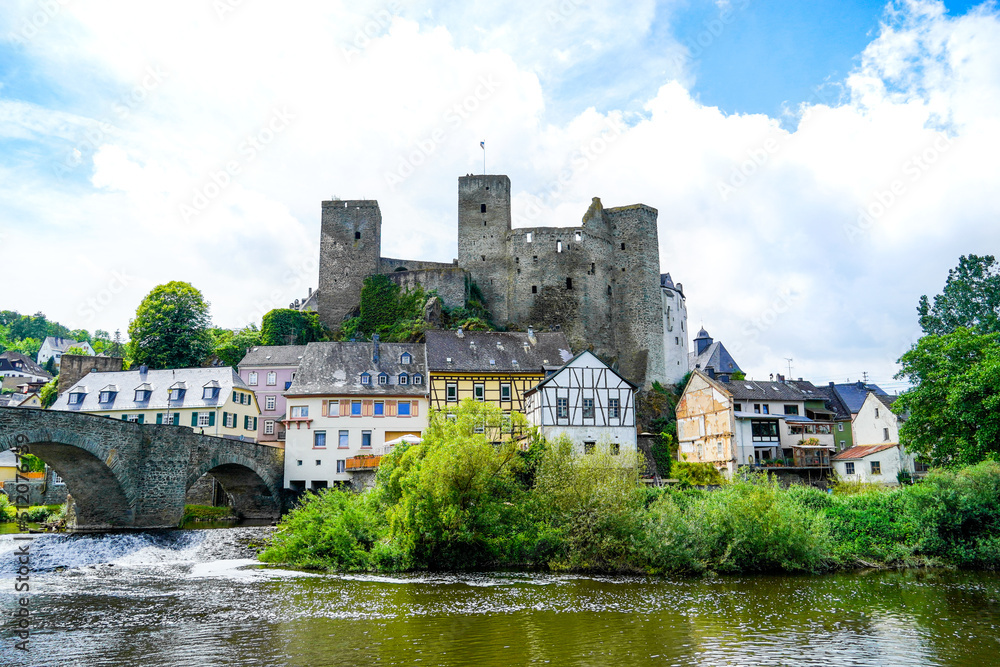 Runkel Castle in Runkel. Old castle on the Lahn with an old stone bridge. Landscape by the river with historic buildings.
Runkel Castle in Runkel. Old castle on the Lahn with an old stone bridge. Landscape by the river with historic buildings.