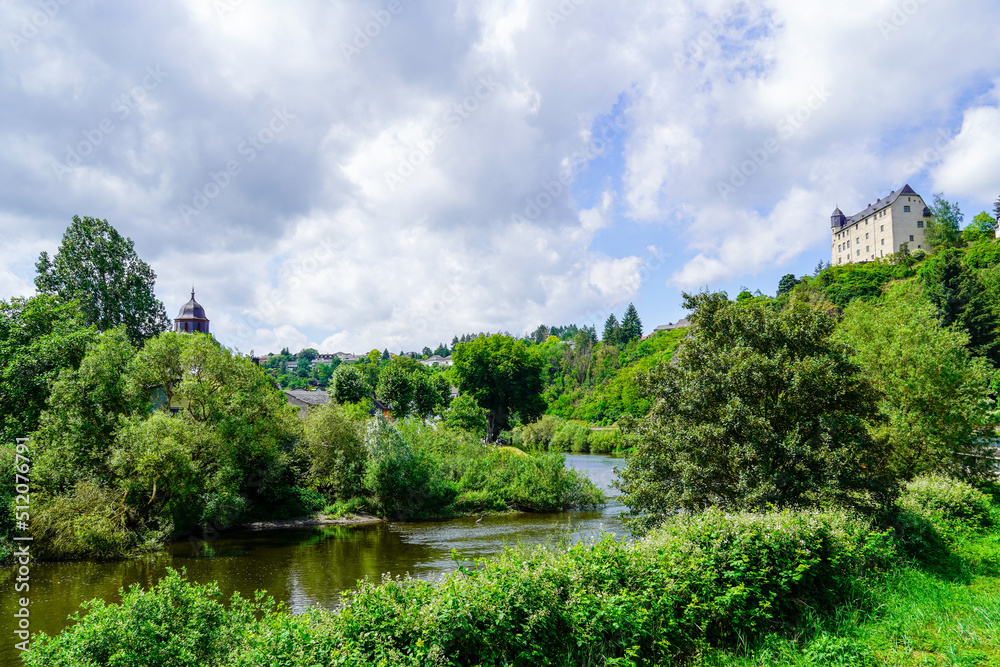 Schadeck Castle in Runkel. Green landscape on the Lahn with the old castle on a hill.
