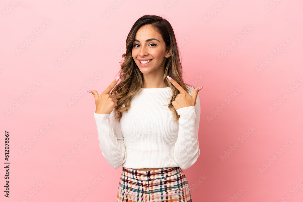 Young woman over isolated background giving a thumbs up gesture Young woman over isolated background giving a thumbs up gesture