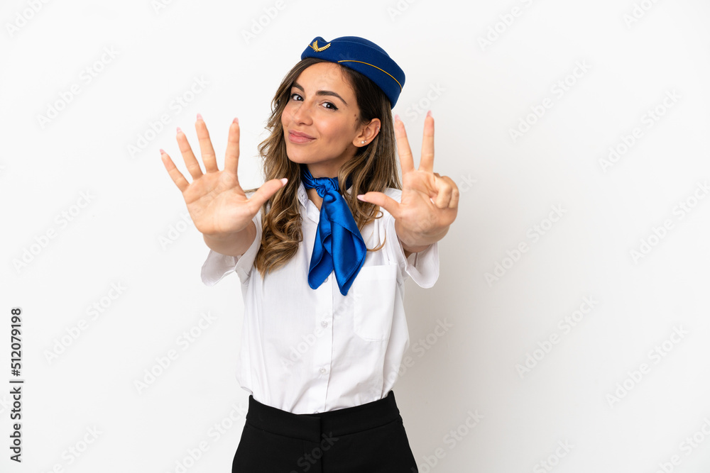 Airplane stewardess over isolated white background counting eight with fingers Airplane stewardess over isolated white background counting eight with fingers