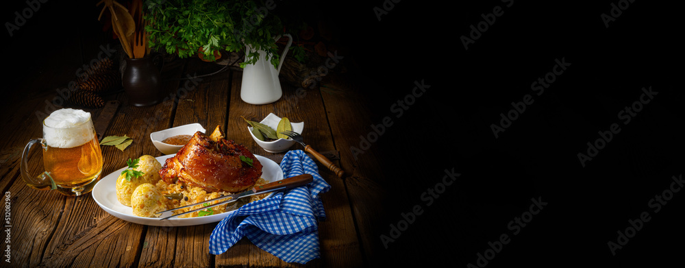 pork knuckle with sauerkraut and sweet mustard