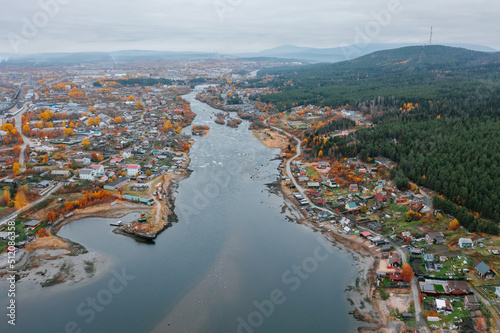 Aerial Townscape and Suburbs of Kandalaksha Town located in Kola Peninsula in Nothern Russia photo