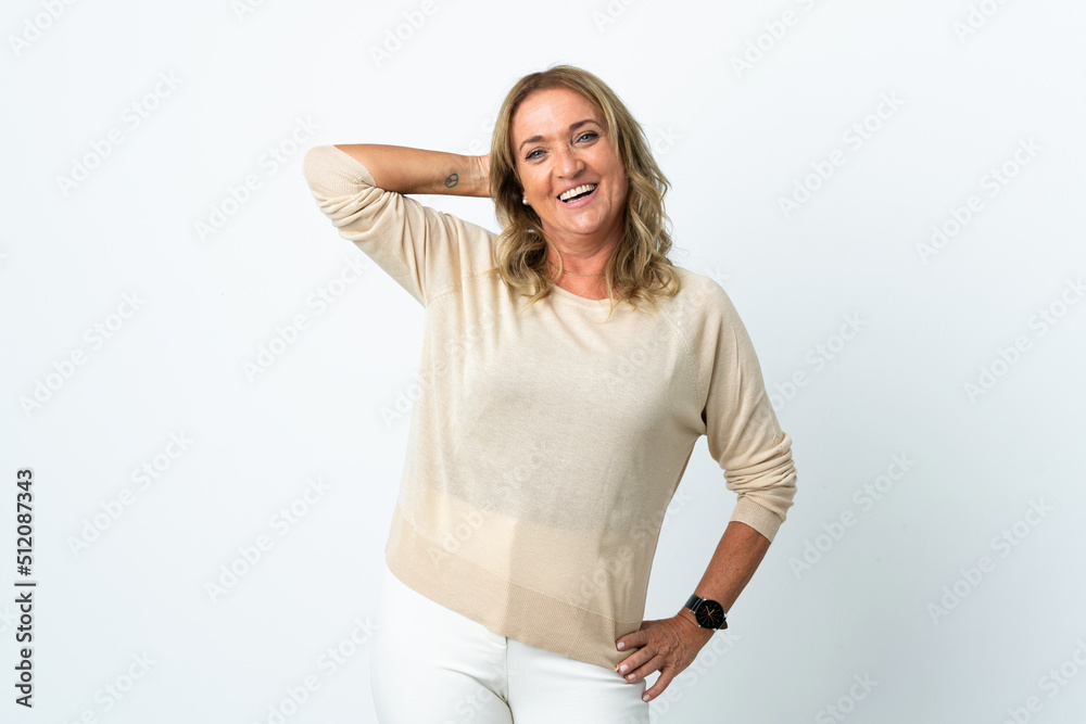 Middle aged blonde woman over isolated white background smiling a lot Middle aged blonde woman over isolated white background smiling a lot