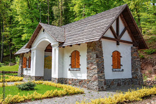 Old stone house in the Austro-Hungarian style in the forest. photo