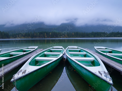 Boats on the Hintersea lake, Germany. Landscape during fog. Lake and trees. R...