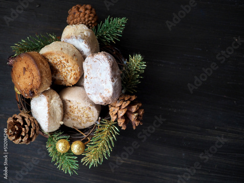 Basket with Polvorons and spruce branches photo