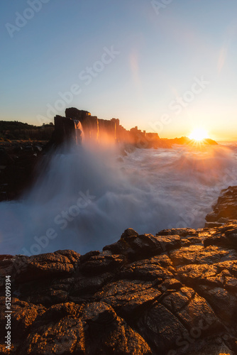 Sunrise view with breaking wave at Bombo Quarry  Australia.