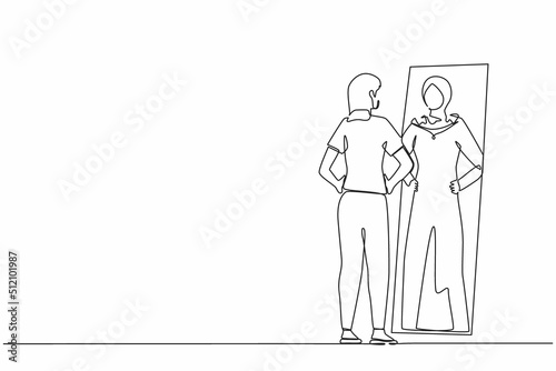 Single continuous line drawing Arab businesswoman looking at reflection in mirror and seeing super hero standing. Leadership, ambition and self confidence. One line graphic design vector illustration