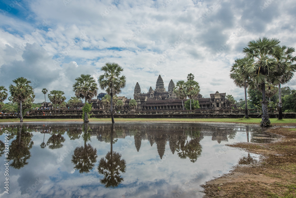 Angkor Wat, an ancient sandstone castle, is a world heritage site in the reflection of water in a pond in front of Siem Reap, Cambodia