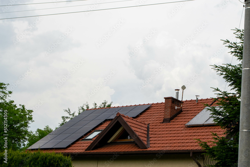 Historic farm house with modern solar panels on roof and wall High quality photo Historic farm house with modern solar panels on roof and wall High quality photo