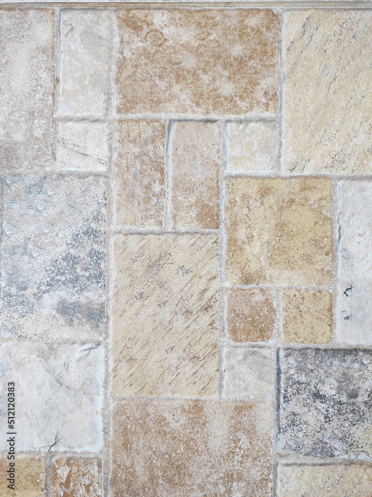 Naklejka premium Multicolored stones on the floor, close-up