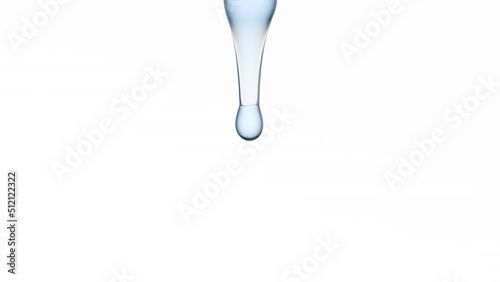 Close up macro shot of drops of blue clear liquid are falling down from lab dropper on white background | Abstract body care cosmetics with plant oils formulation concept photo