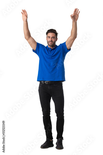 Man with raised arms on white